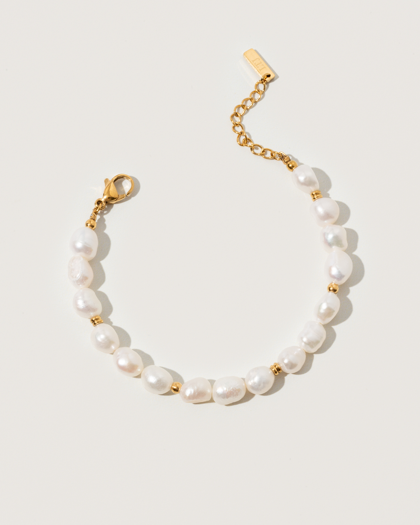 Pearl & charms bracelets